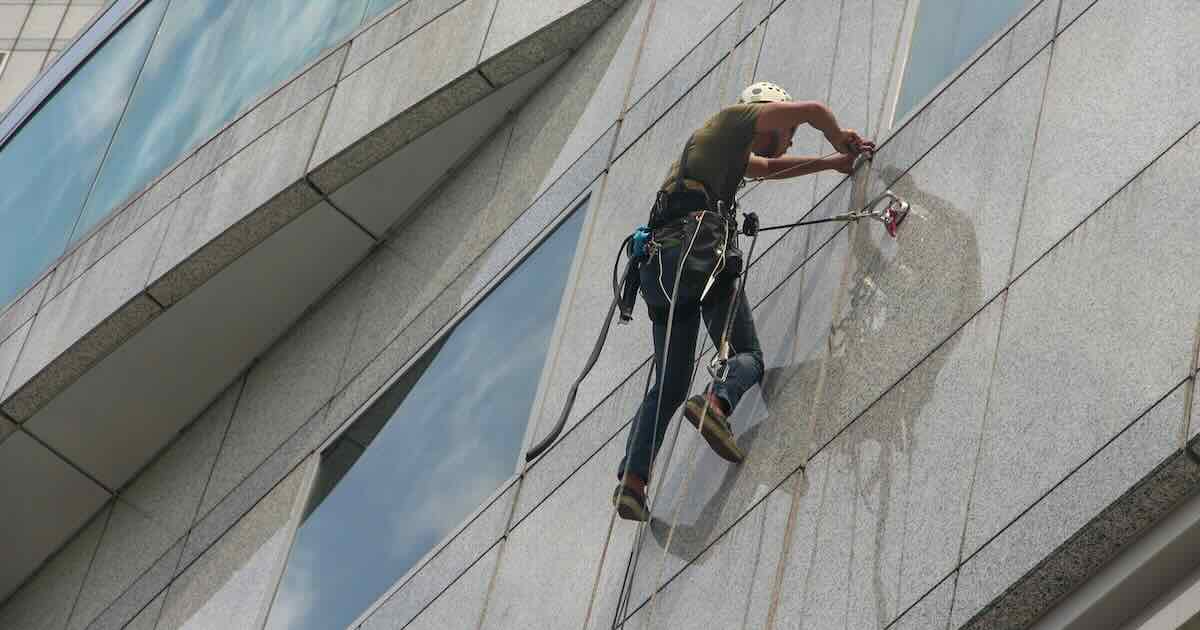 Window cleaner on a harness